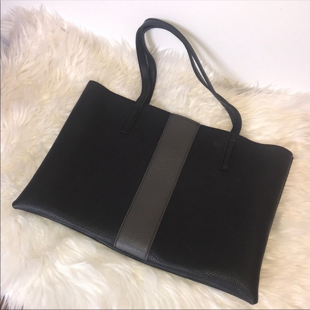 Brand new tote still in dust cover.. Great tote